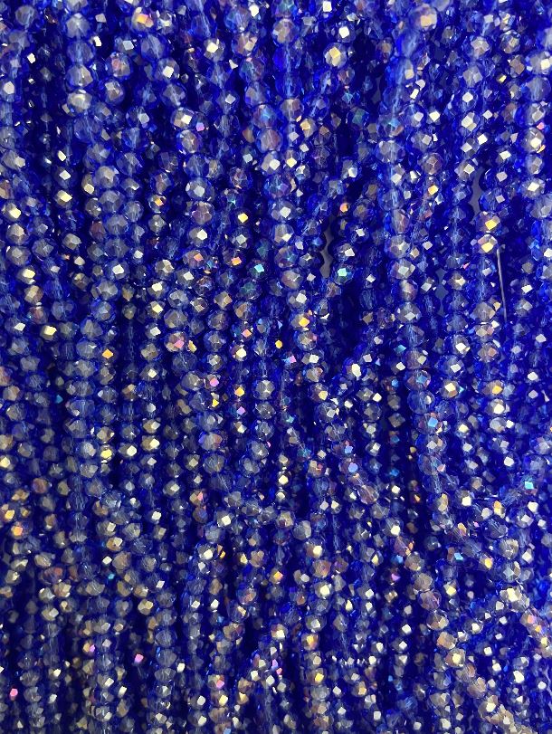 Korálky Český křišťál na niti modré průhledné s benzínovým leskem, broušený rondel, průměr 3,5×3 mm, délka 36 cm +