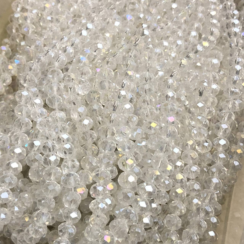 Korálky českého křišťálu na niti, bílé průhledné s benzínovým odstínem, brusovaný rondel, průměr 6×4,5 mm, délka 38–40 cm +