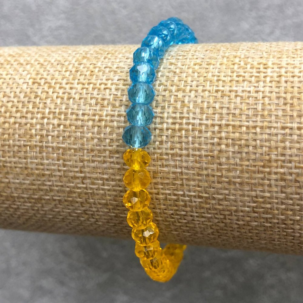 Náramek na gumičce z českého křišťálu Ukrajina broušený rondel, průměr 6×4 mm, délka 18 cm