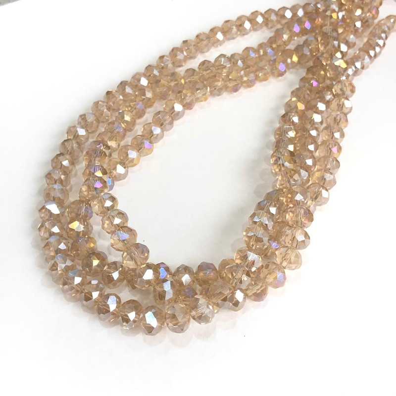 Korálky z českého křišťálu na niti, šampaň, průhledné s jemným benzínovým leskem, fasetovaný rondel, průměr 8×6 mm, délka 40–42 cm