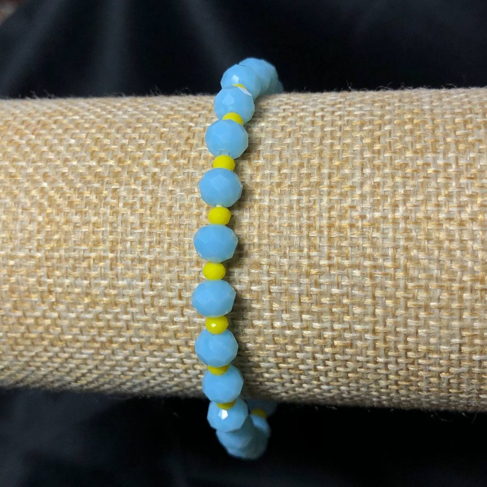 Náramek na gumičce z českého křišťálu Ukrajina brusované rondely, průměr 6×4 mm ±, délka 18 cm ±