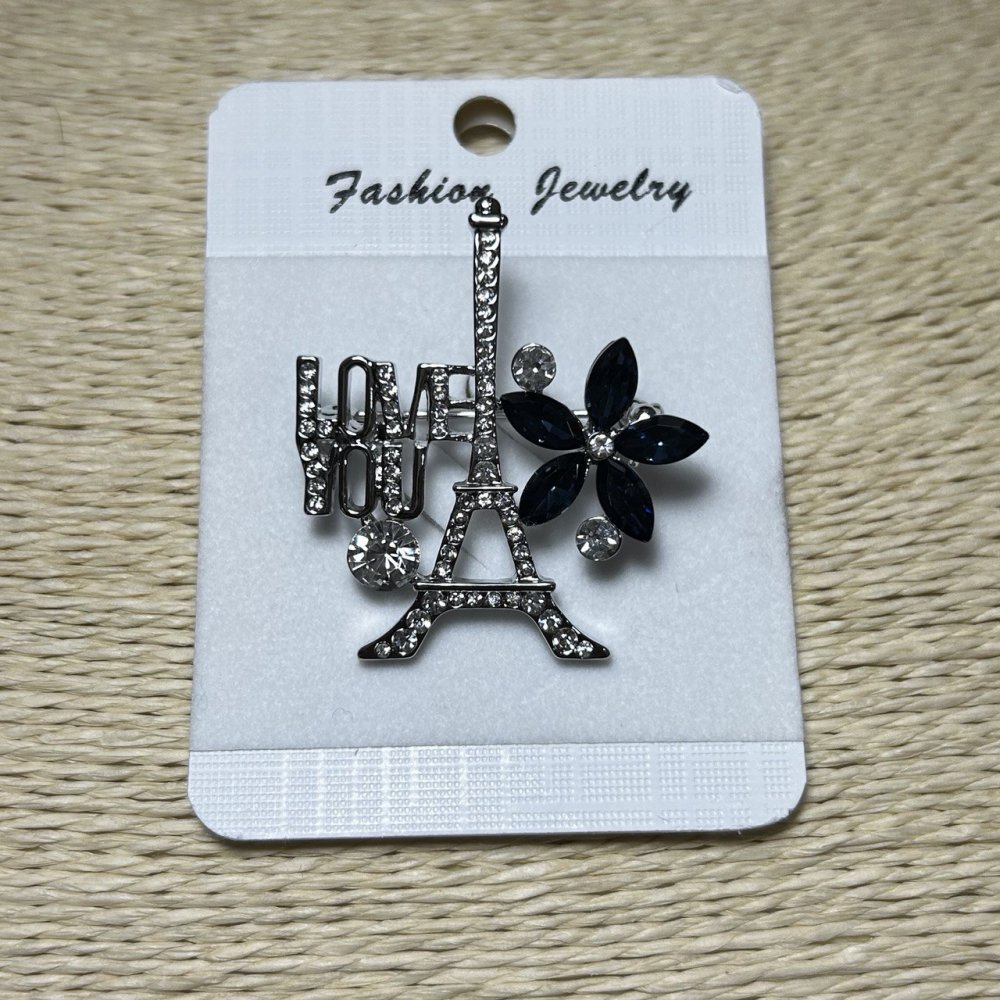 Brož Paříž, stříbrný kov, štras a modré krystaly 40×35 mm +