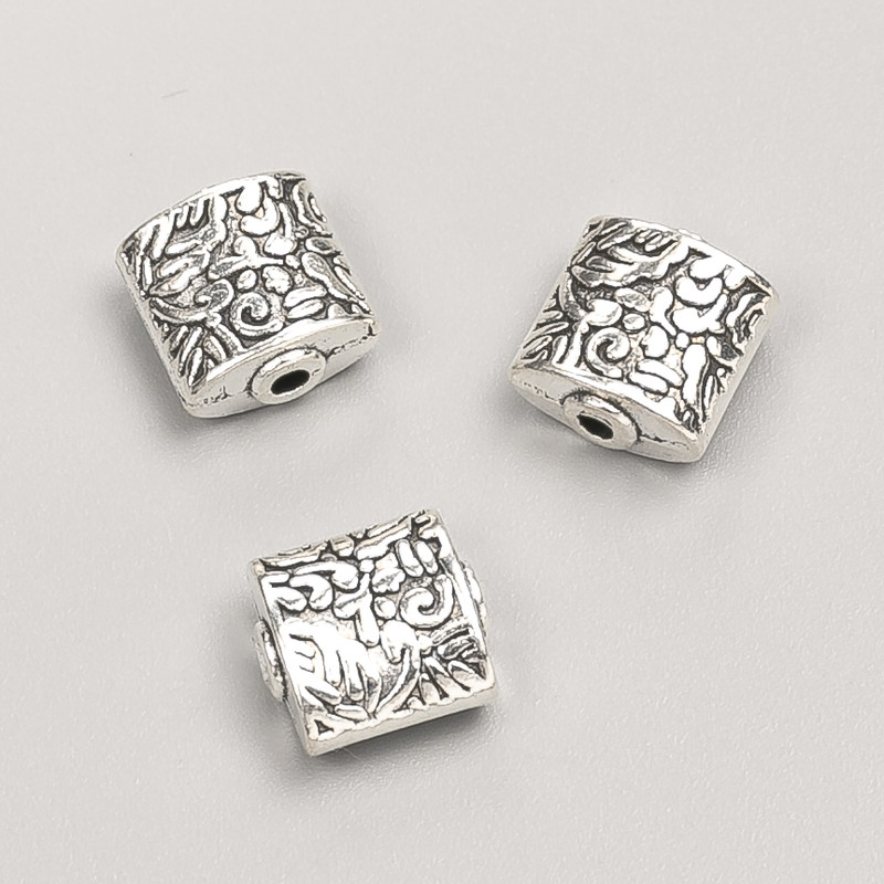 Korálka-vložka šperkového příslušenství, průměr 10×5 mm, facetované, 20 g, 9 ks ±, barva kovu 'stříbrná'