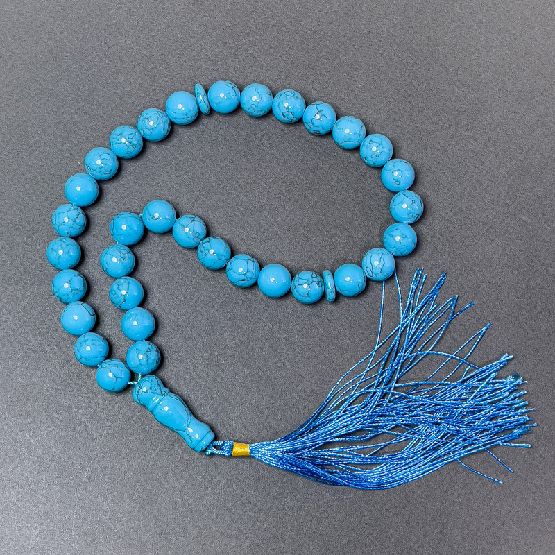 Růženec z tyrkysu (přes.) hladká kulka, průměr cca 12 mm ± 33 korálky, se vložkami tyrkysu